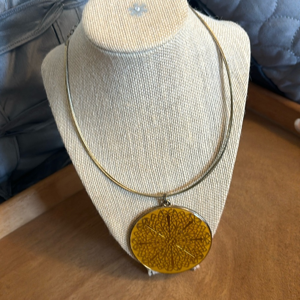Gold tone large disk fashion statement necklace